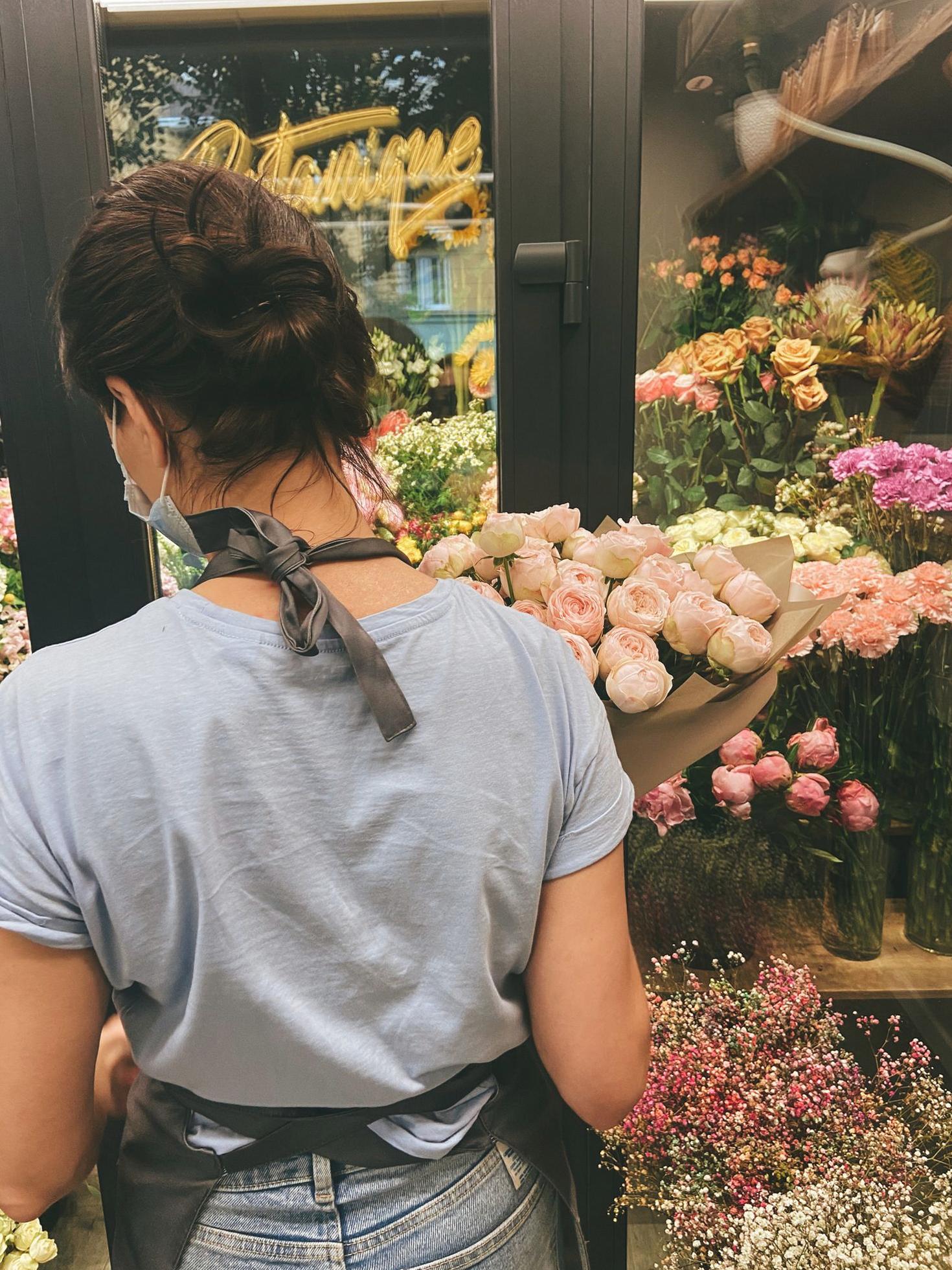 Florist arranging roses